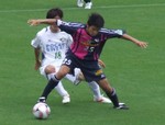 セレッソMF濱田とヴォルティスMF高橋の攻防